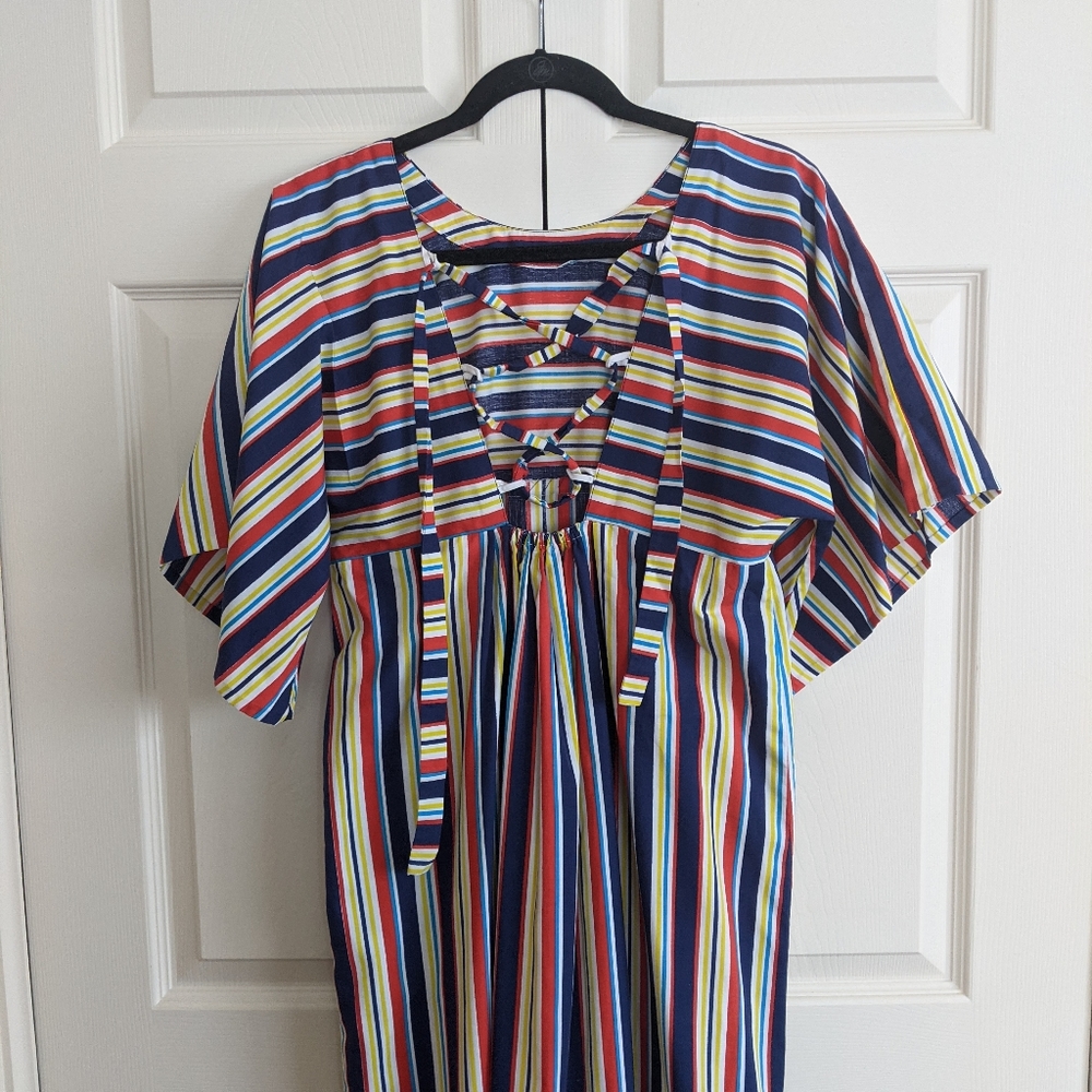 Handmade dress with flowy sleeves